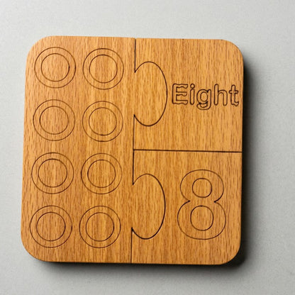Wooden puzzle piece with 'Eight Five Eight' engraving on a gray background